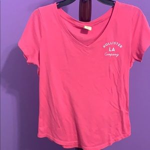 Pink Hollister shirt.